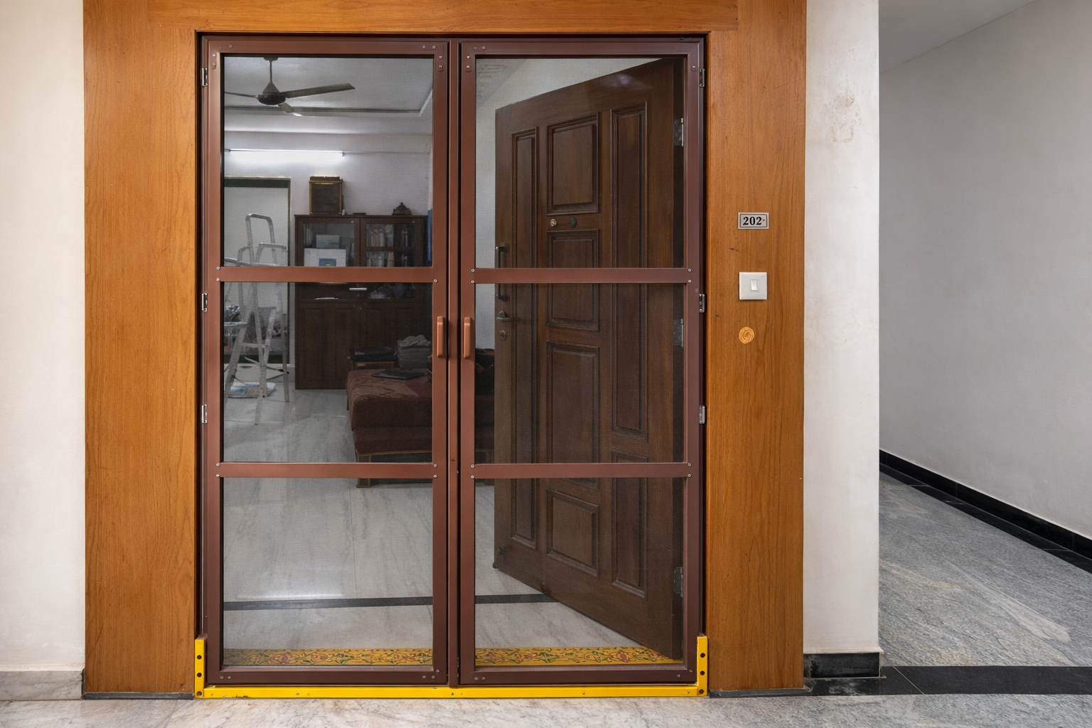 Mosquito mesh door installation by Rushika Creative Interiors